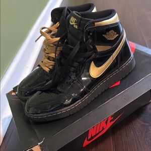 Jordan Black and Gold Sneakers